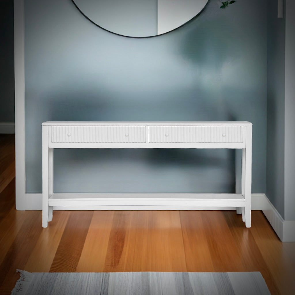 The Vienna - 2 Drawer White Console, natural, brings a contemporary feel with its sleek design and textured drawer face. Built with sustainable white cedar its 2 drawers sit on wooden runners. Colour white. Measures 1500 length X 250 depth X 750 height. Styled.