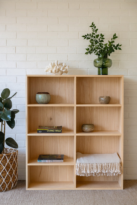 The Virgo Bookshelf Large. 8 compartments of storage in a 4 x 2 configuration. Constructed from solid white cedar. Colour Natural. Measures 1700 Height x 1200 Wide x 350 Depth. Styled.