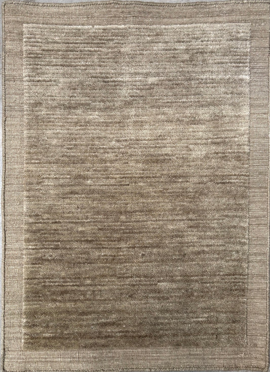 Yarra Moss piled hand-woven wool rug in a muted earthy green with a low channeled pile and flat woven border. Available in 4 sizes. Top View.