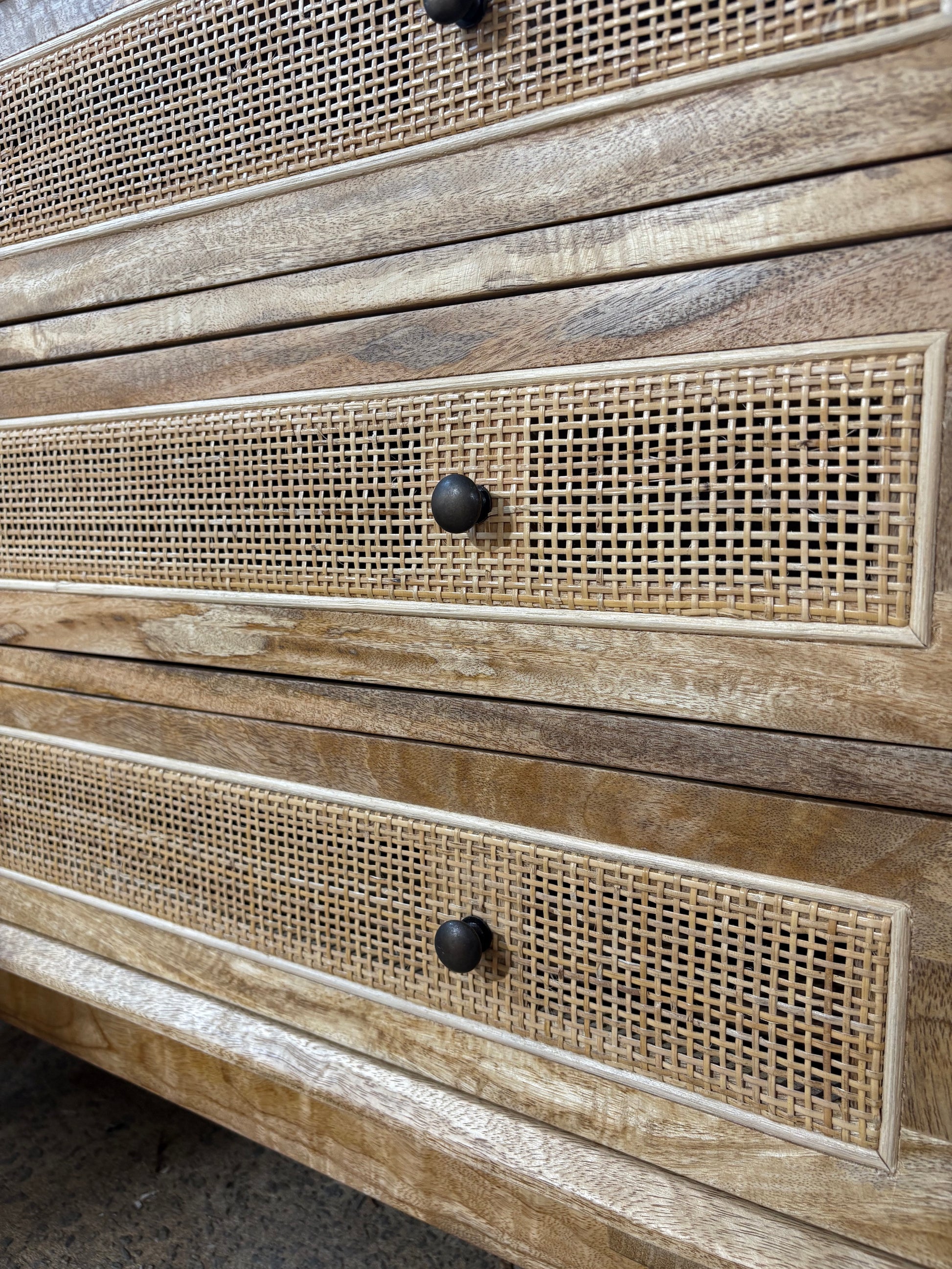The Yosemite 3 Drawer chest features a solid white cedar frame and drawers.  Open mesh rattan drawer face with drawers on wooden runners. stylish turned legs. Measures 850W x 450D x 750H. Close.