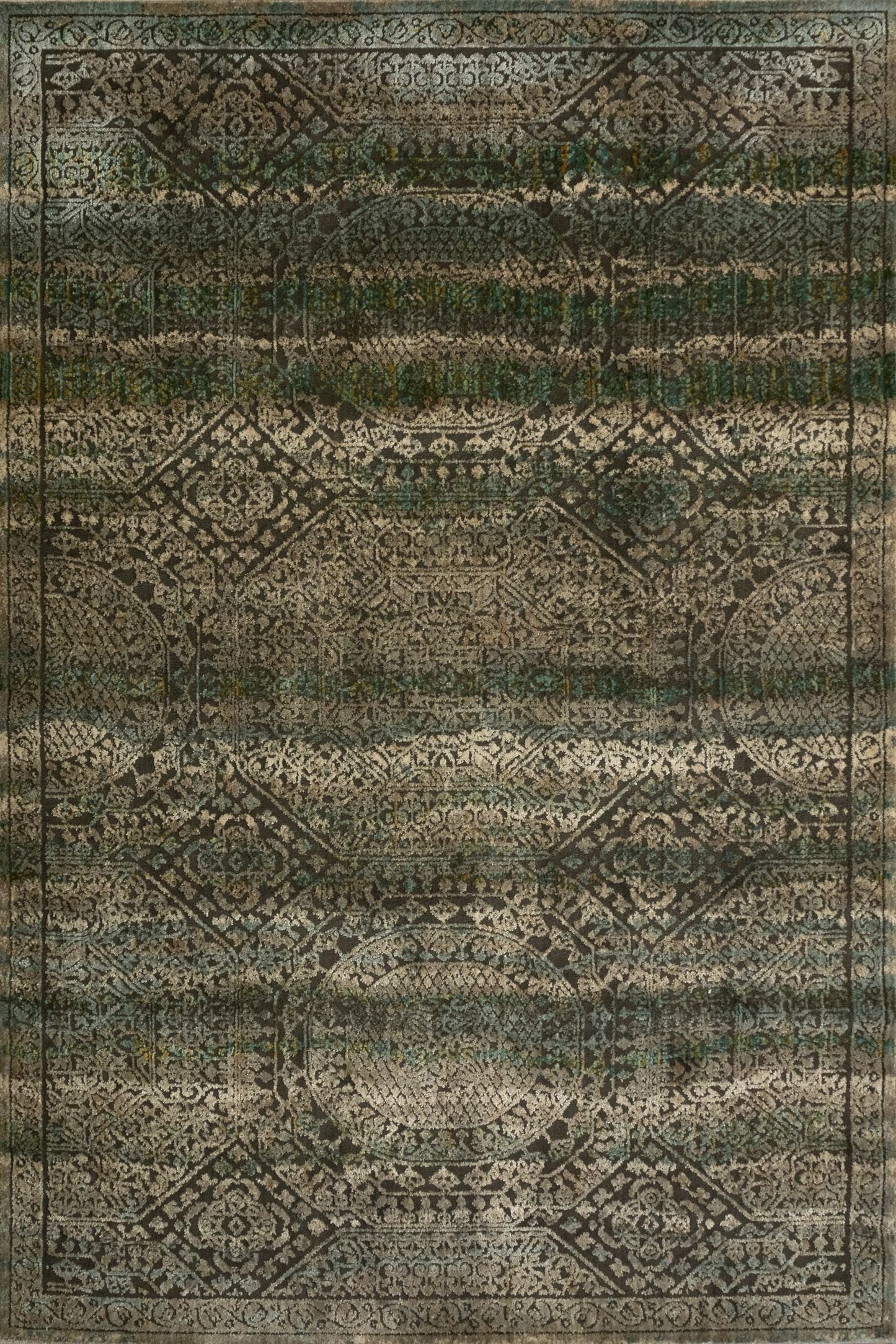 Zarita 114 GC3-U is a machine made rug from soft and durable polyester. Featuring a  tribal design pattern. Colours Brown with, Blacks and Light Beige accents. Sizes 160 X 235, 200 X 285, 240 X 320 and 300 X 380. Full.