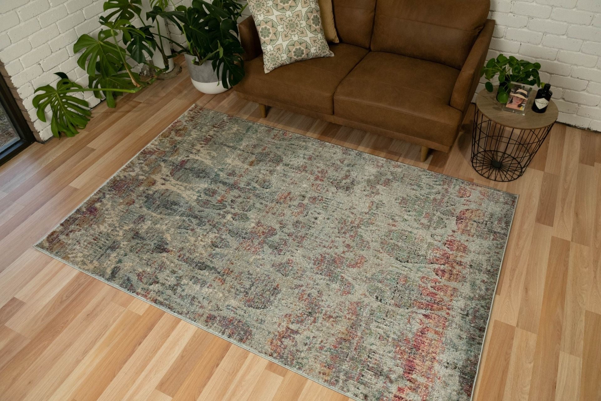 Zarita Dynasty is a machine made rug from soft and durable polyester. Featuring a tribal/Ikat design pattern. Colours Beige with Light Grey,Blue and Brown accents. Sizes 200 X 285, 240 X 320 and 300 X 380. Life.