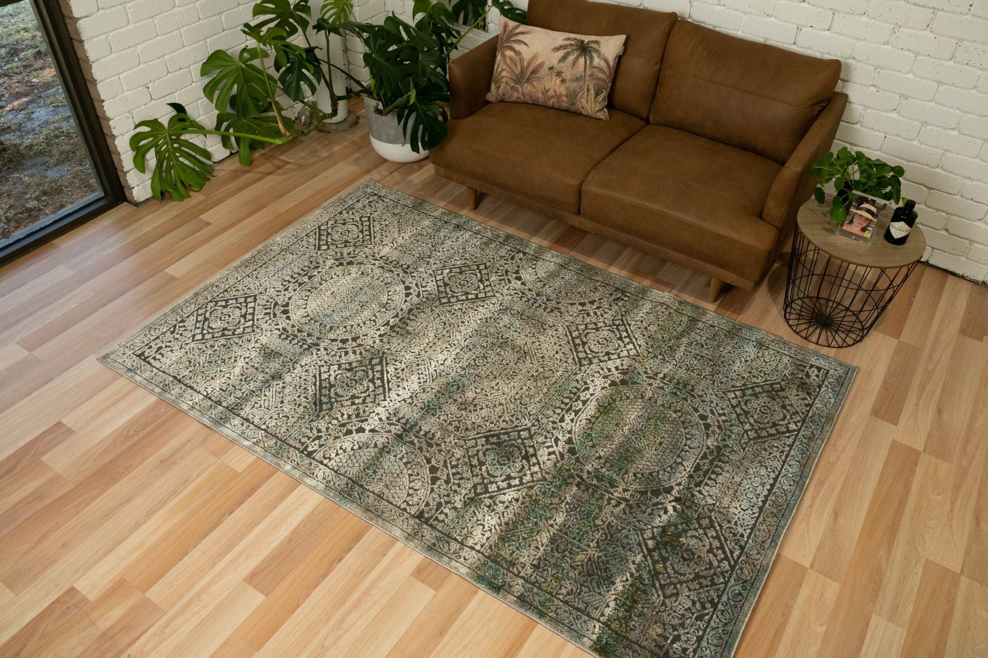 Zarita Regal is a machine made rug from soft and durable polyester. Featuring a  tribal design pattern. Colours Brown with, Blacks and Light Beige accents. Sizes 160 X 235, 200 X 285, 240 X 320 and 300 X 380. Life.