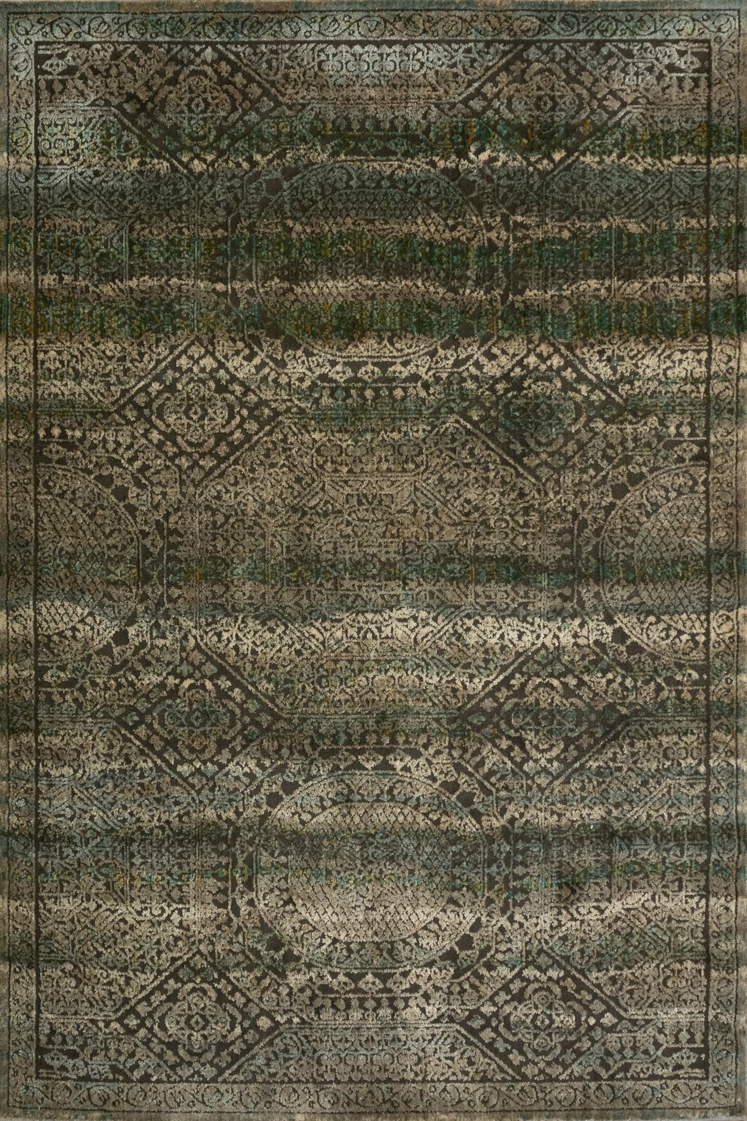 Zarita Regal is a machine made rug from soft and durable polyester. Featuring a  tribal design pattern. Colours Brown with, Blacks and Light Beige accents. Sizes 160 X 235, 200 X 285, 240 X 320 and 300 X 380. Full.