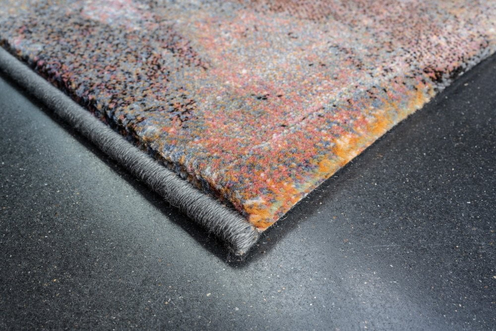 The Zenith Drift rug. Featuring a modern and contemporary design, this machine made rug is crafted from heat-set polypropylene for durability. Colours Multi. 3 Sizes. Corner.