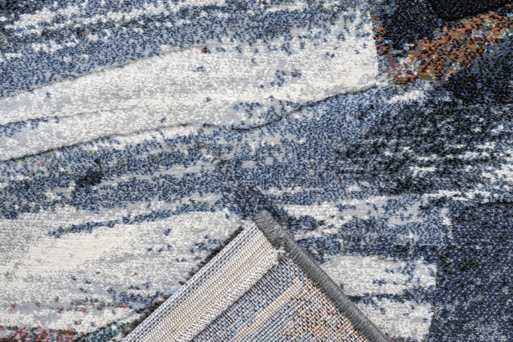 The Zenith Drift rug. Featuring a modern and contemporary design, this machine made rug is crafted from heat-set polypropylene for durability. Colours Multi. 3 Sizes. Fold.