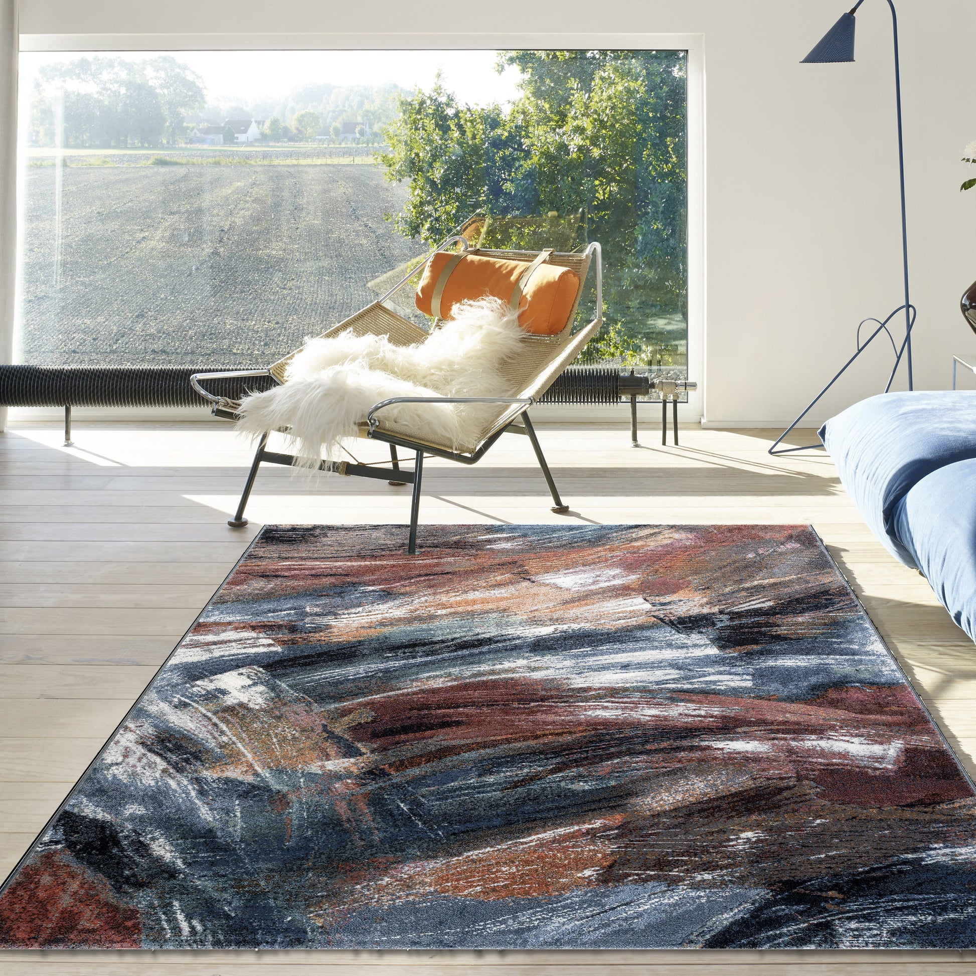 The Zenith Drift rug. Featuring a modern and contemporary design, this machine made rug is crafted from heat-set polypropylene for durability. Colours Multi. 3 Sizes. Styled.