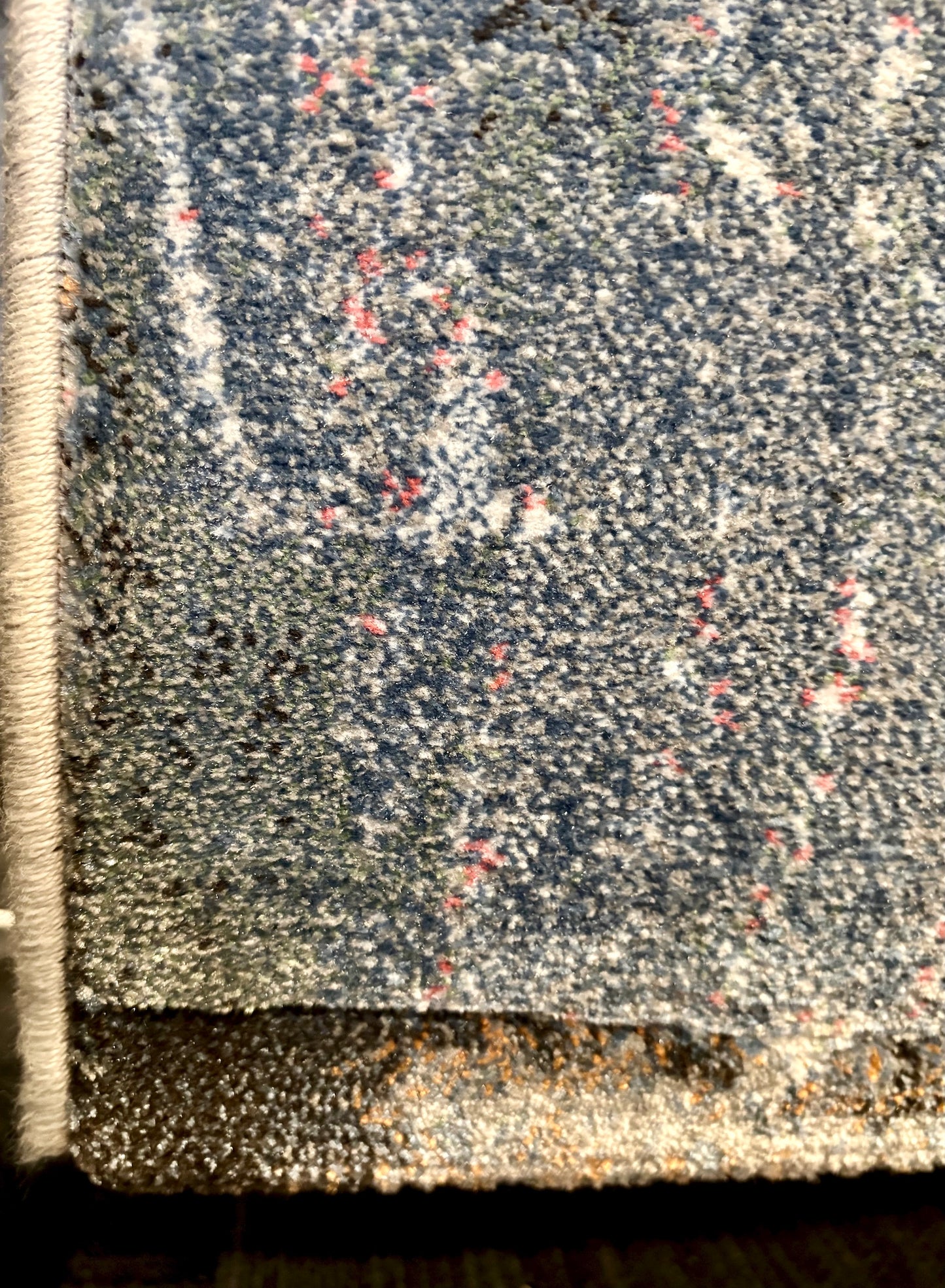 The Zenith Flux rug. Skilfully crafted from durable heat-set polypropylene, this rug features a chic contemporary design. Colours, greys, white, beige, blues. 3 Sizes. Corner.