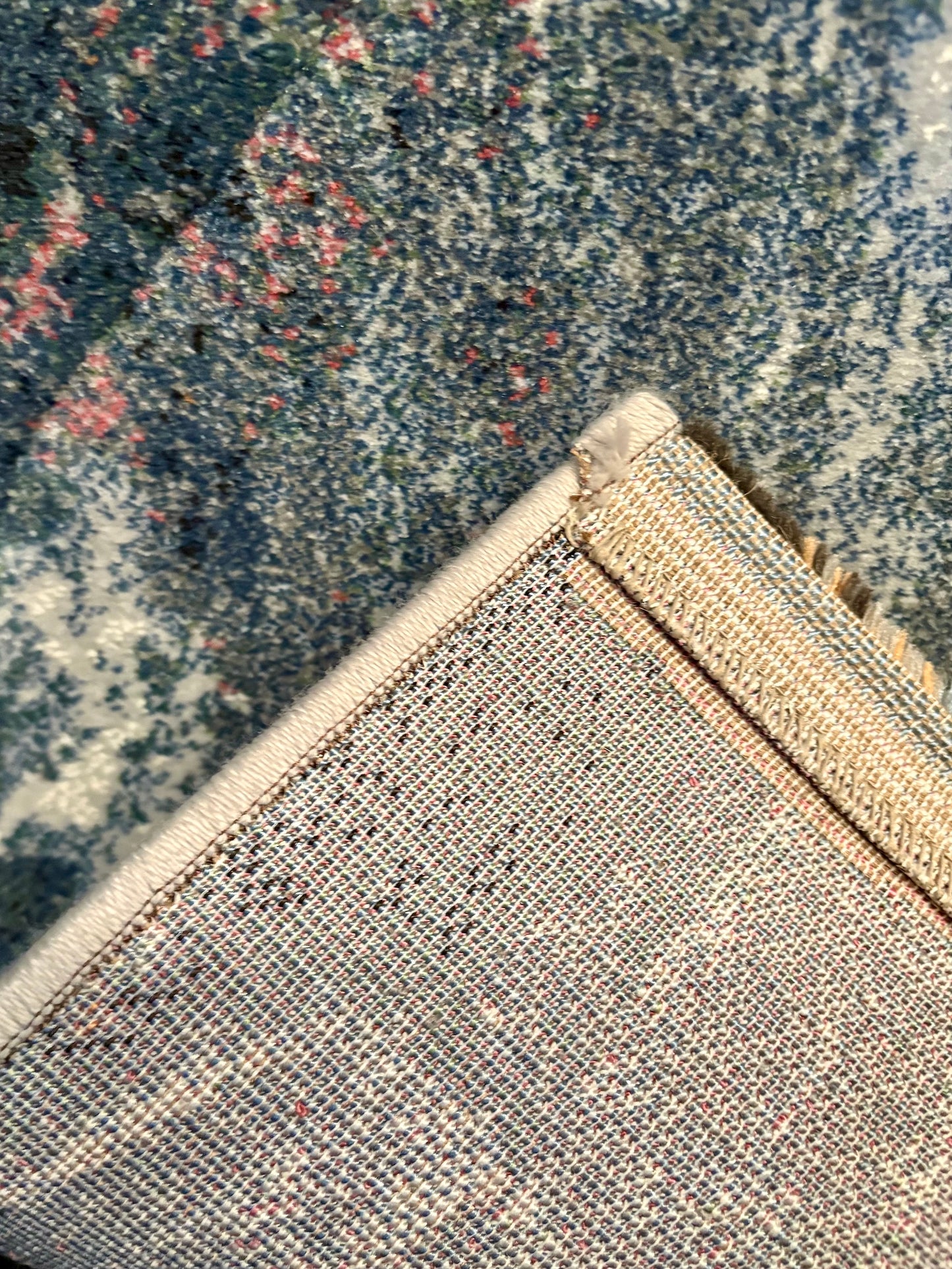 The Zenith Flux rug. Skilfully crafted from durable heat-set polypropylene, this rug features a chic contemporary design. Colours, greys, white, beige, blues. 3 Sizes. Fold.