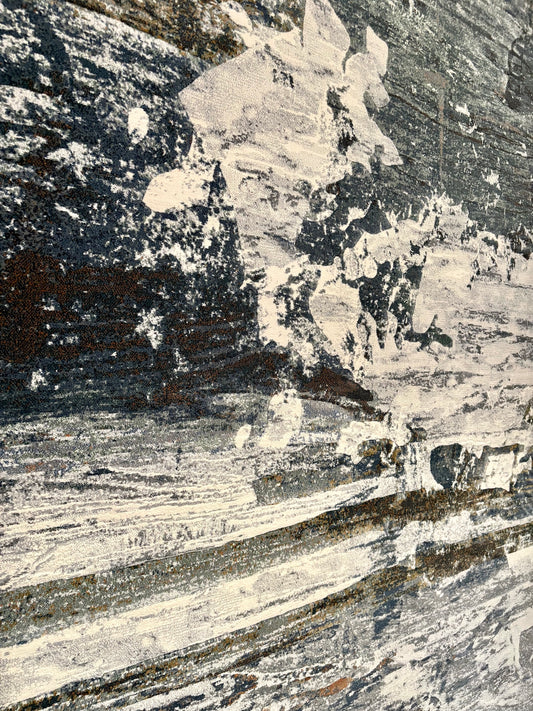 The Zenith Strata rug. This rug is skilfully created from strong heat-set polypropylene, showcasing a stylish contemporary design. Colours, whites, greys, blues, beiges. Close Angle.