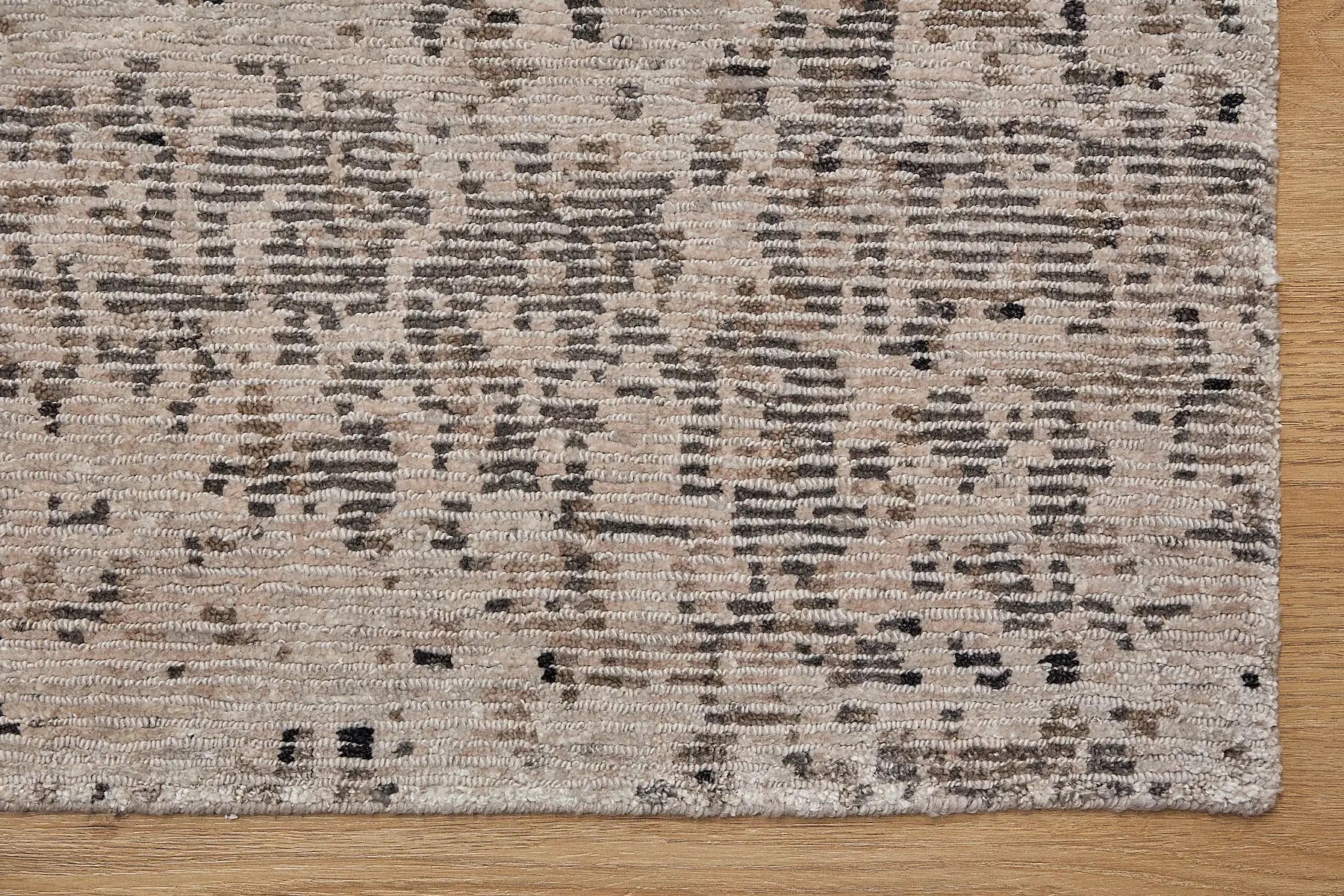 Zurich Grey is a luxurious contemporary/modern designed rug.  Hand Knotted from a blend of wool and bamboo Silk. Colours Light Grey, Dark Grey, and Grey. Sizes 200 X 290, 250 X 300 and 270 X 360. Corner.