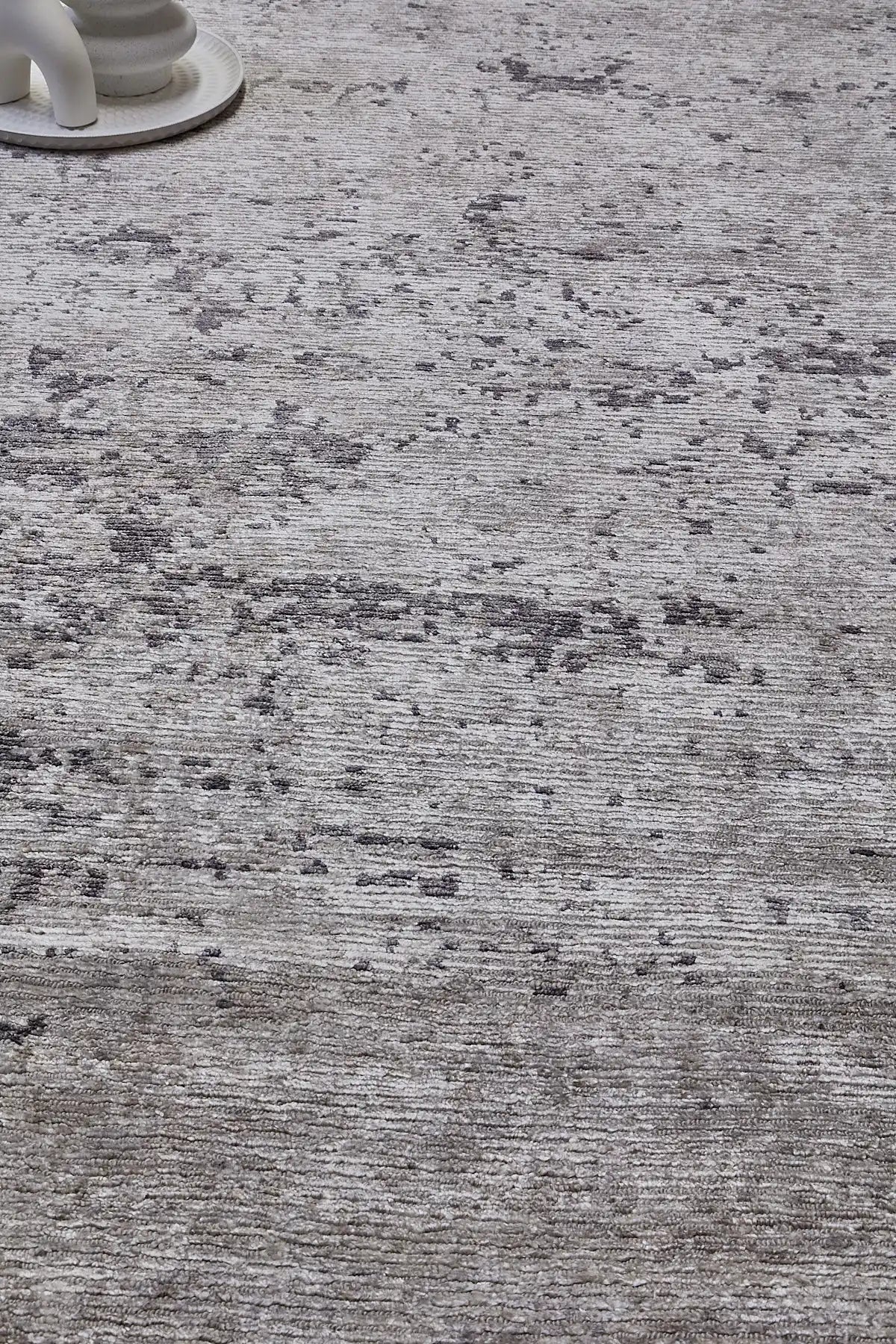 Zurich Smoke is a luxurious contemporary/modern designed rug.  Hand Knotted from a blend of wool and bamboo Silk. Colours Dark Grey, Grey, and Light Greys. Sizes 200 X 290, 250 X 300 and 270 X 360. Life.