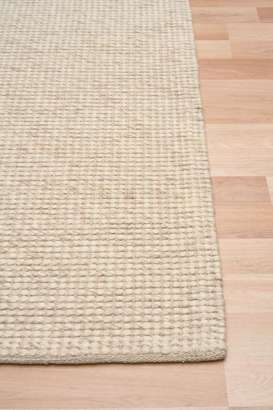 Dasha Runner - Beige is a texture hand woven rug runner made of 80%  New Zealand Wool and 20% Polyester. Colour Beige. Size 80 X 320. Front.