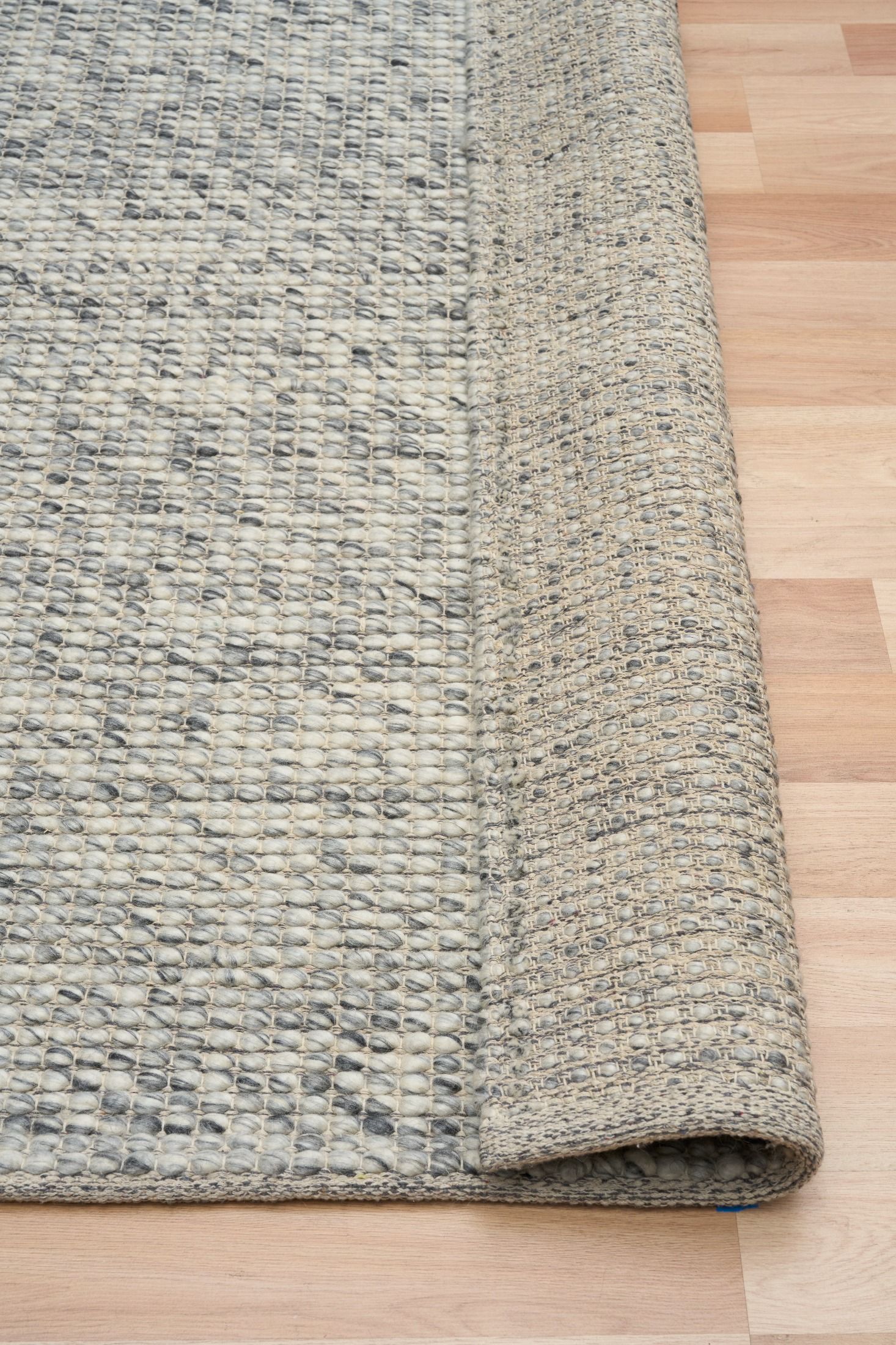 Dasha Runner - Grey is a texture hand woven rug runner made of 80%  New Zealand Wool and 20% Polyester. Colour Beige. Size 80 X 320. Long Fold.