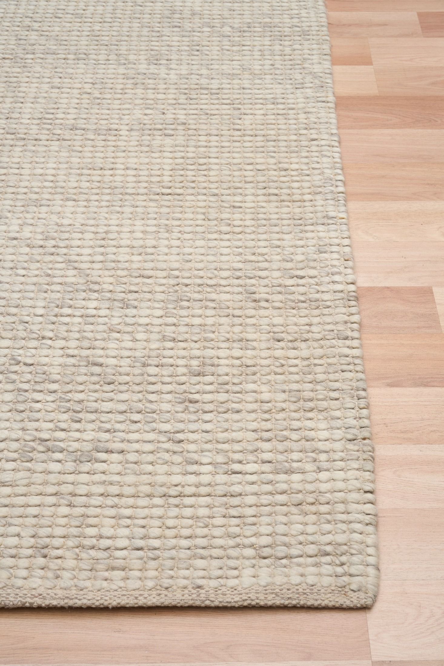 Dasha Runner - Light Grey is a texture hand woven rug runner made of 80%  New Zealand Wool and 20% Polyester. Colour Beige. Size 80 X 320. Front.
