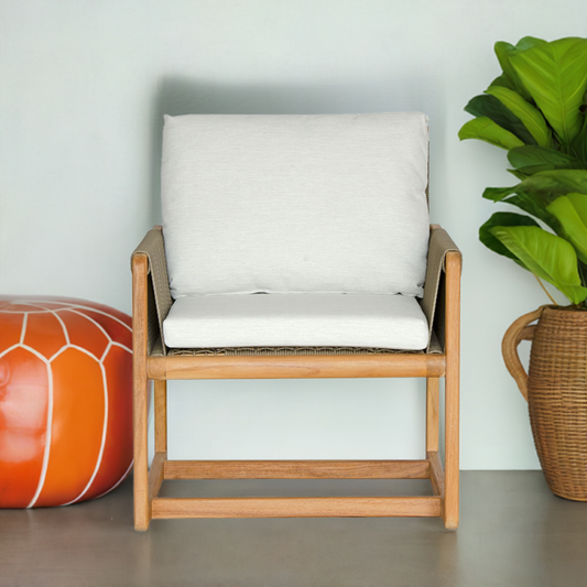 The Azalea Occasional Chair. Made with sustainable solid teak frame, with rope, and UV resistant cotton twill cushions. This occasional chair exudes style while providing comfort and durability. Measures 700 Wide X 700 Depth X 800 Back Height - 470 Seat Height. Styled.